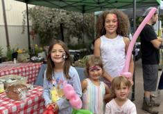Children pose from Family Day at the Market
