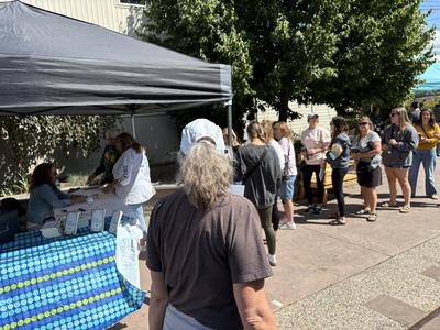 Special guest JL Hyde hosts a book signing at the market