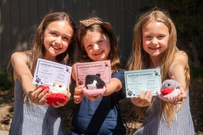 Girls visit Knotty Noodles to adopt a pet